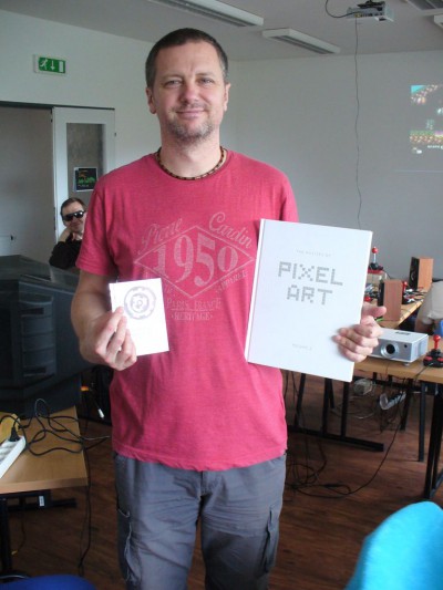 Winner of Revision 2017 Oldskool Music PCH and his prize from Revision 2017